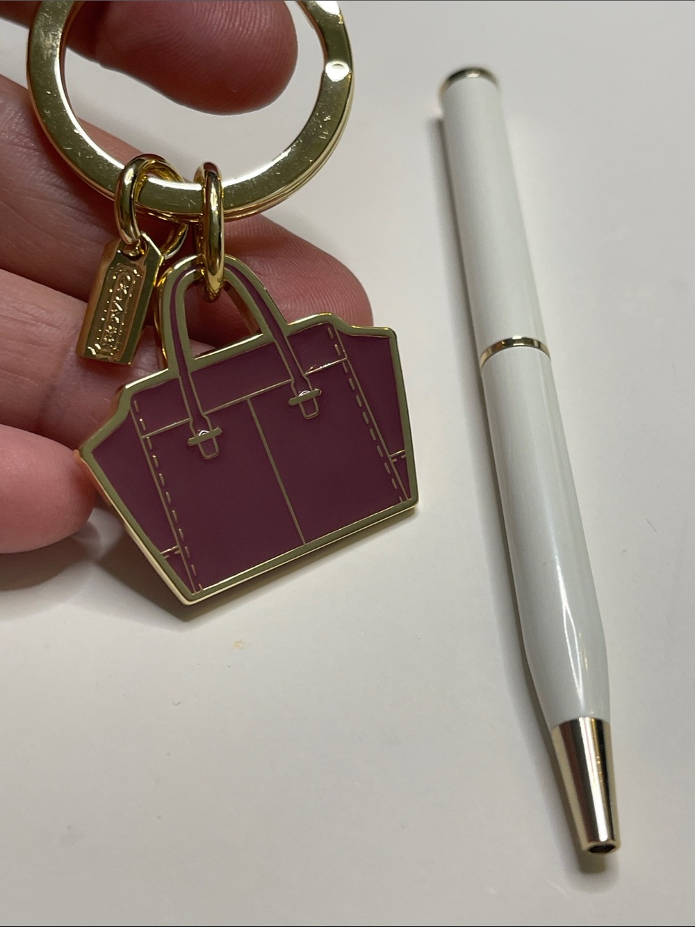 Coach Gold-Tone Keyring with Mauve Enamel Tote Charm